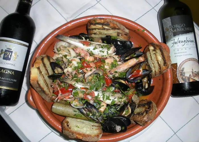 - - Ristorante L'oasi Couette-café 3*